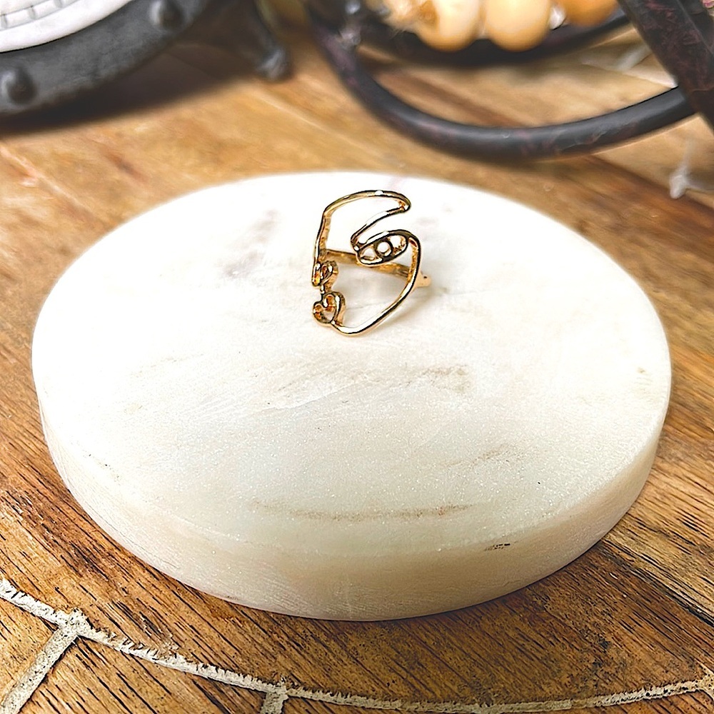 Gold face ring